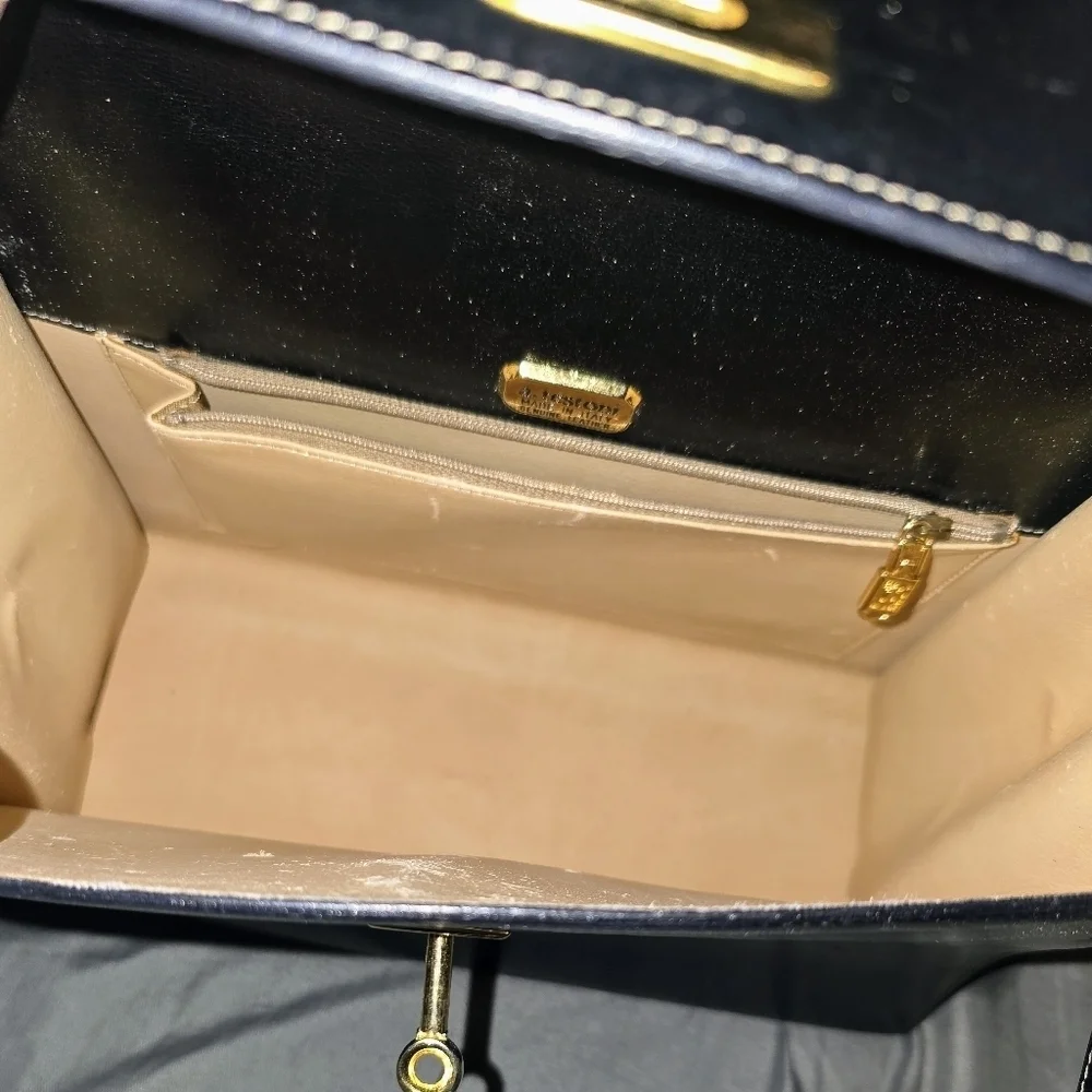 A. Textoni Black Leather Handbag With Lock